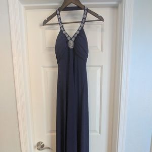 Long purple dress with sequins and open back